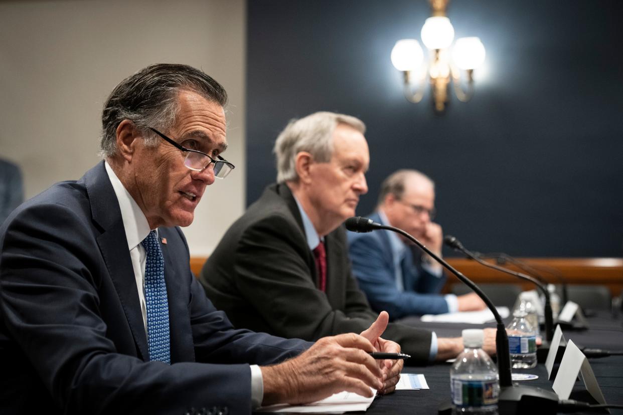 Sen. Mitt Romney, R-Utah, speaks during a roundtable discussion with Republican Senators and economists about the Democrats social policy spending bill on Capitol Hill on Nov. 30.