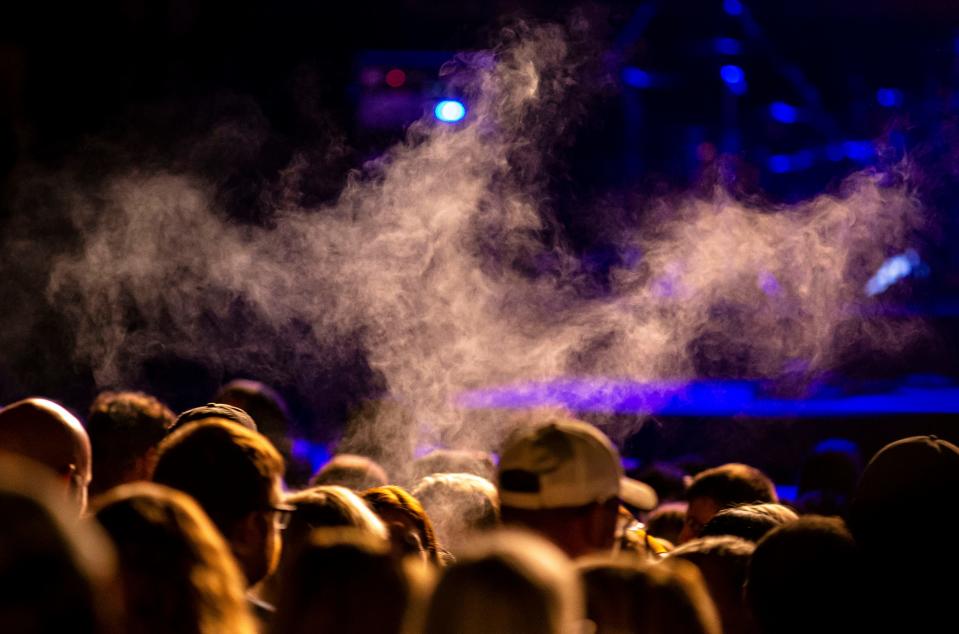 A concertgoer exhales from a vape pen as Kane Brown performs on the Grandstand Stage during the Illinois State Fair at the Illinois State Fairgrounds in Springfield, Ill., Friday, August 13, 2021. [Justin L. Fowler/The State Journal-Register] 
