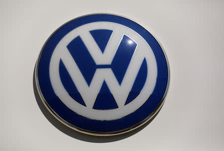 The logo of Volkswagen carmaker is seen at the entrance of a showroom in Nice, France, April 8, 2019. REUTERS/Eric Gaillard