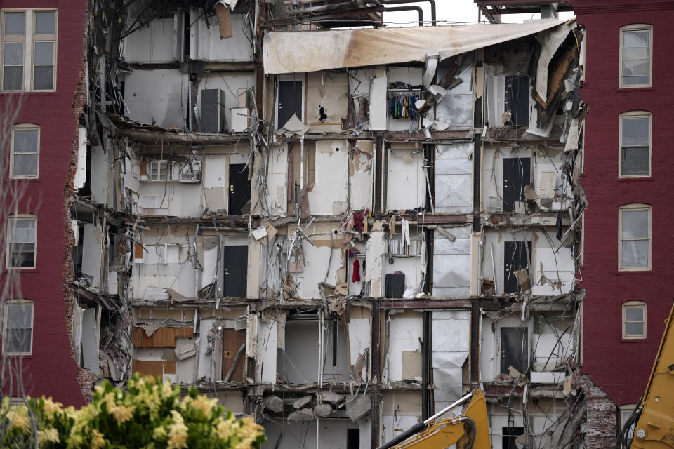 Seen is the damage from a collapsed apartment building, Monday, June 5, 2023, in Davenport, Iowa. The six-story, 80-unit building partially collapsed May 28. (AP Photo/Charlie Neibergall)