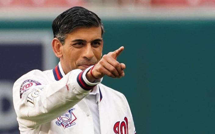 Rishi Sunak, the Prime Minister, is pictured attending a baseball game in Washington last night - Kevin Lamarque/PA