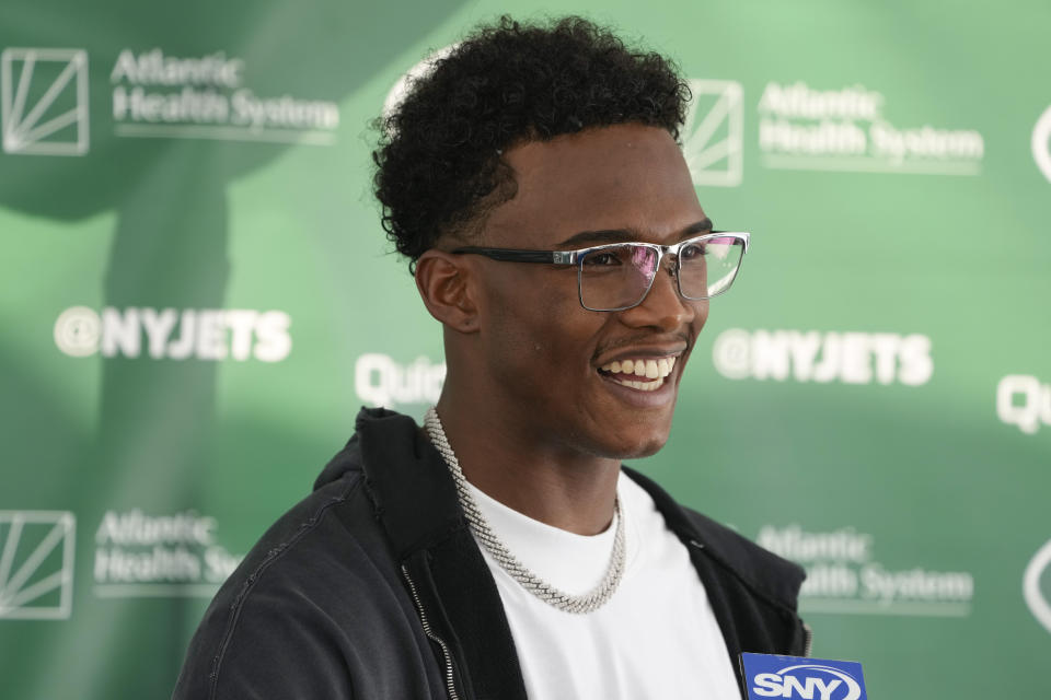 Wide receiver Garrett Wilson, the 2022 offensive rookie of the year, didn't hold back in discussing the Jets' hopes this season. (AP Photo/Seth Wenig)