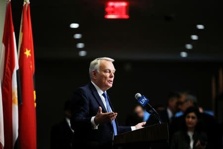 France's Foreign Minister Jean-Marc Ayrault speaks with media after voting on a draft resolution that demands an immediate end to air strikes and military flights over Syria's Aleppo city, at the U.N. Headquarters in New York, U.S., October 8, 2016. REUTERS/Eduardo Munoz