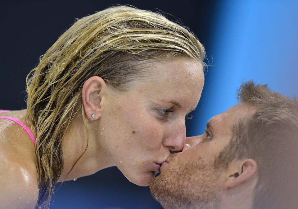 Jessica Hardy of the U.S. kisses her boyfriend Dominik Meichtry at the Aquatics Centre before the start of the London 2012 Olympic Games