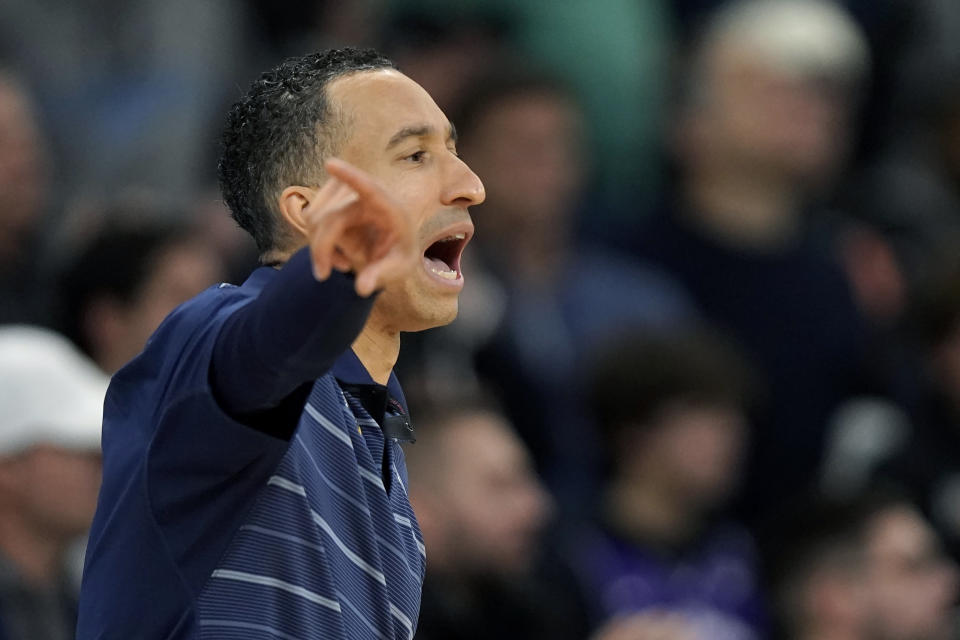 Marquette coach Shaka Smart shouts from the bench during the second half of the team's NCAA college basketball game against Providence, Tuesday, Dec. 19, 2023, in Providence, R.I. (AP Photo/Steven Senne)