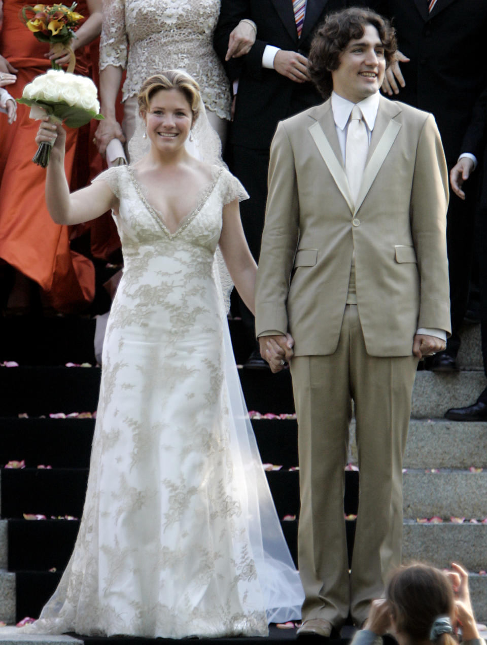 Justin Trudeau, son of the late Prime Minister Pierre Elliot Trudeau and his new bride Sophie Gregoire pose for photos following their wedding ceremony in Montreal, May 28, 2005. REUTERS/Christinne Muschi   CM