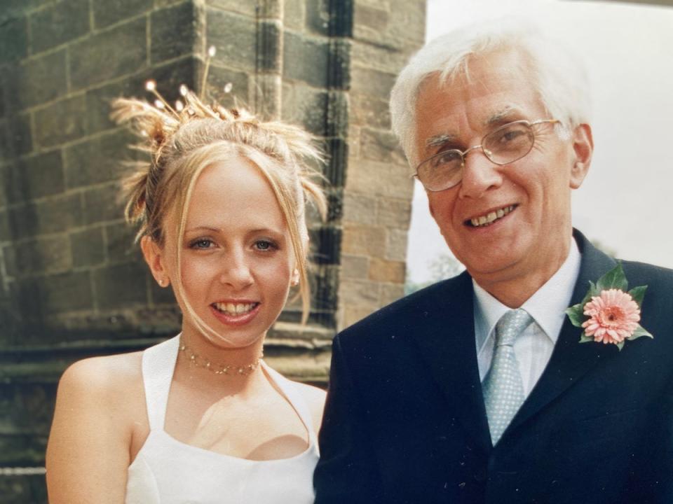 Recognii founder Sarah Harrison with her father David on her wedding day (Supplied)