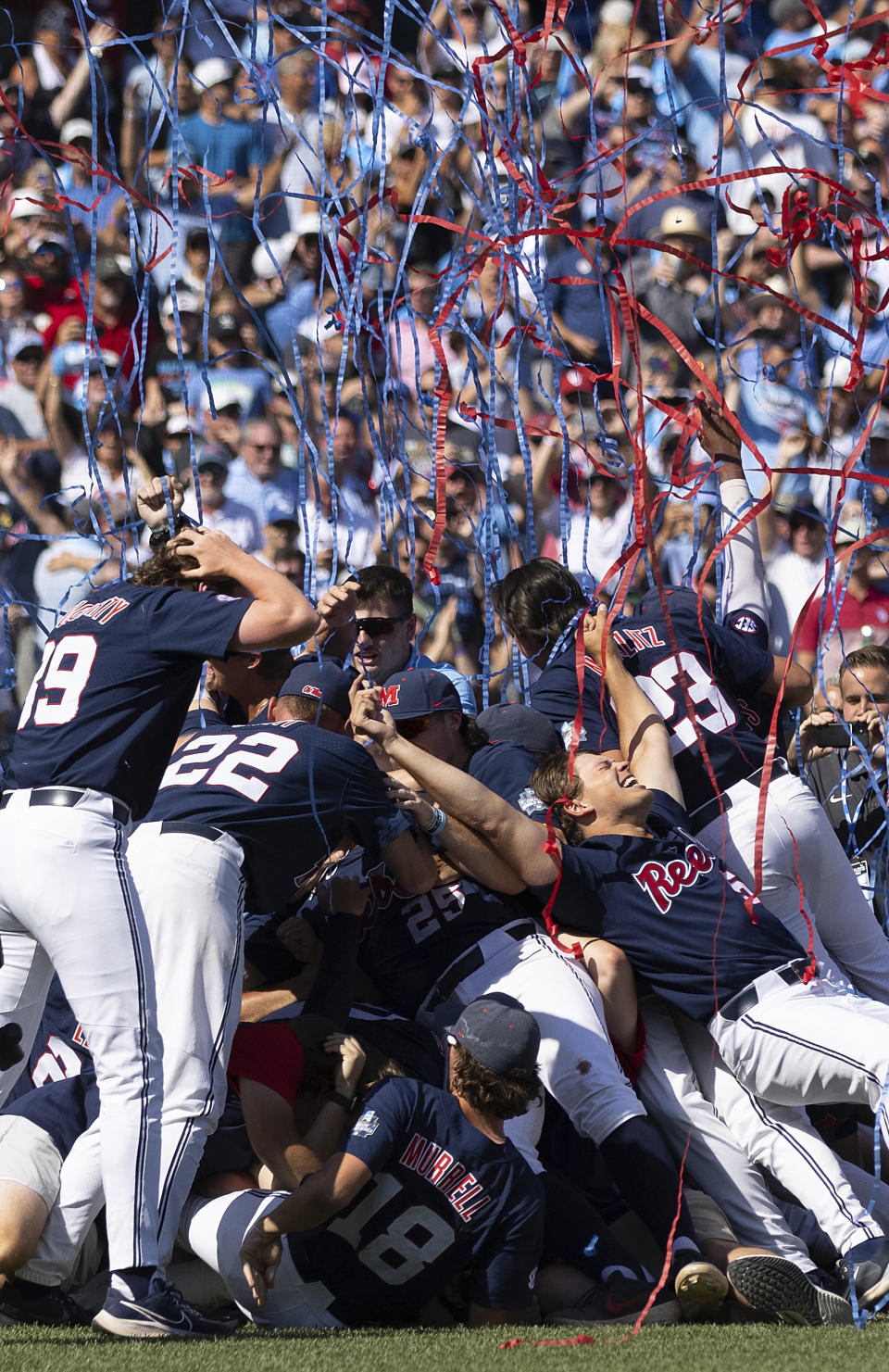 Mississippi players celebrate following their 4-2 victory over Oklahoma to win Game 2 of the NCAA College World Series baseball finals, Sunday, June 26, 2022, in Omaha, Neb. Mississippi defeated Oklahoma 4-2 to win the championship. (AP Photo/Rebecca S. Gratz)