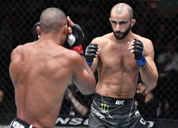 LAS VEGAS, NEVADA - AUGUST 28: (R-L) Giga Chikadze of Georgia battles Edson Barboza of Brazil in a featherweight fight during the UFC Fight Night event at UFC APEX on August 28, 2021 in Las Vegas, Nevada. (Photo by Chris Unger/Zuffa LLC)