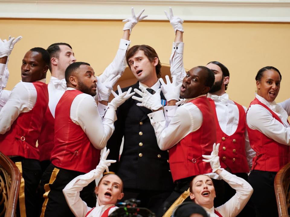 Hodgson, centre, sings a musical number in character as Prince Andrew (Channel 4)