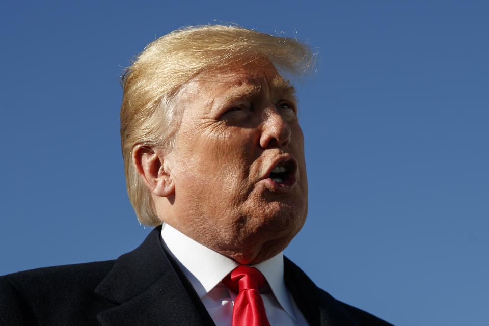 President Donald Trump speaks to media on the tarmac before boarding Air Force One, Thursday, Oct. 18, 2018, in Andrews Air Force Base, Md., en route to speak at a campaign rally in Neptune Aviation Services, Missoula, Mont. (AP Photo/Carolyn Kaster)