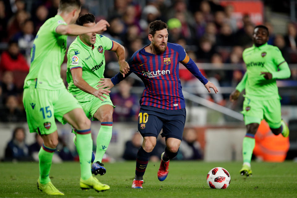 Lionel Messi was a one-man show for Barcelona against Levante, scoring one goal and setting up two others in a 3-0 win. (Eric Verhoeven/Getty)