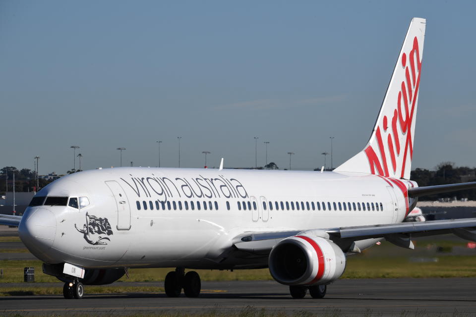 A Virgin Australia Boeing 737-800 plane at Sydney's Kingsford Smith International airport on August 25, 2021 in Sydney, Australia.