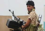 A fighter from Yemen's southern separatist movement holds a position in a street of the country's second city of Aden on January 28, 2018, during clashes with forces loyal to the Saudi-backed president