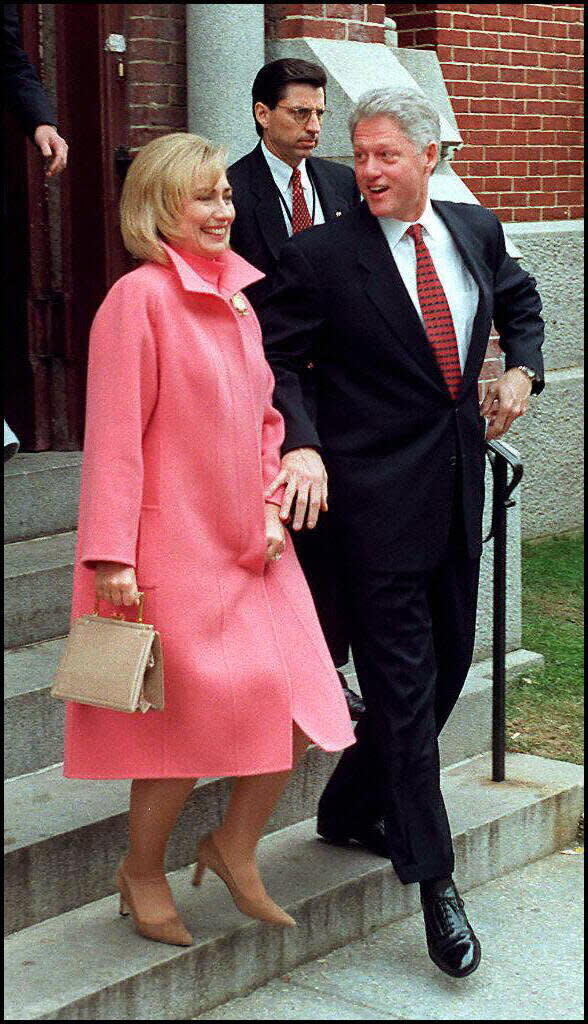 The couple leaves the national prayer service ahead of Clinton's second inauguration in 1997.