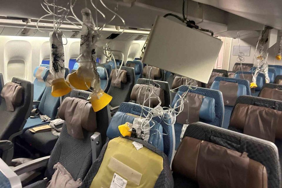 <p>REUTERS/Stringer</p> Interior of Singapore Airline flight SQ321