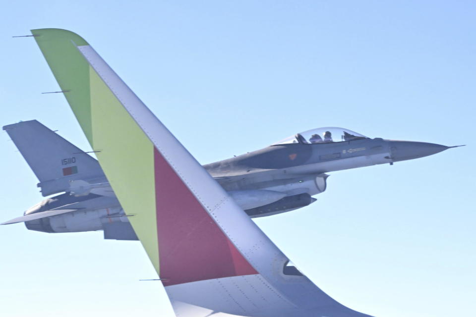 F-16 fighter of the Portuguese Air Force flanks the papal flight carrying Pope Francis directed to Rome, at the end of the 37th World Youth Day in Lisbon, Sunday, Aug. 6, 2023. (Maurizio Brambatti/Pool Photo Via AP)