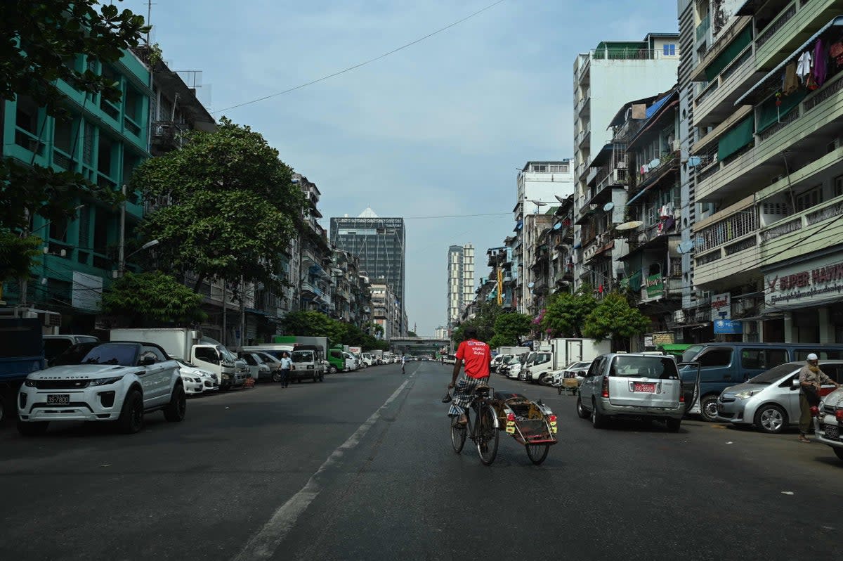 An almost empty street in the commercial hub of Yangon (AFP)