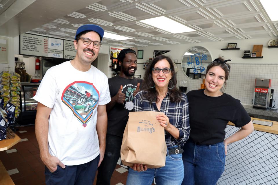 Lohud food and dining reporter Jeanne Muchnick with owners Vincent Cox and Bettina Warshaw; and Phillip Dixon, who is in charge of the kitchen, at Benny's Brown Bag in Peekskill, Sept. 1, 2023.