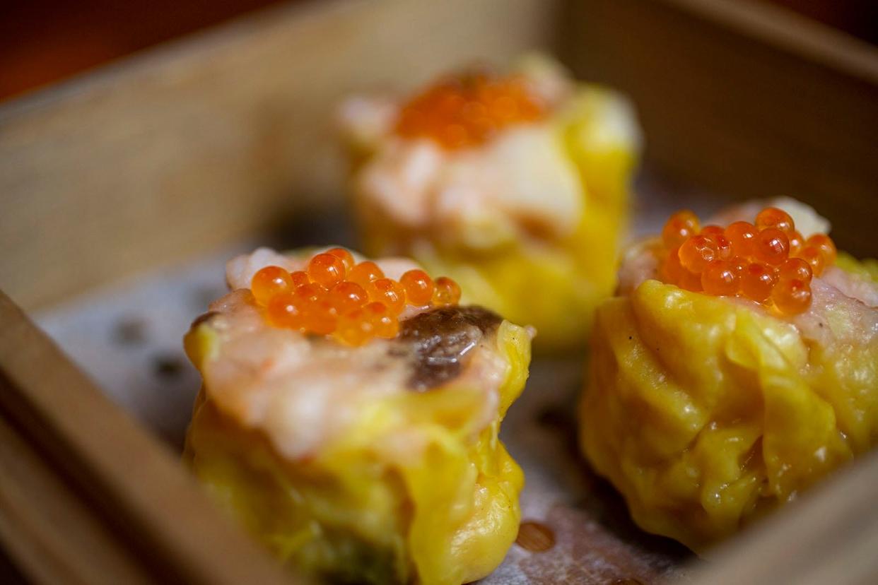 Scallop shumai with salmon roe at Qi: Modern Asian Kitchen.