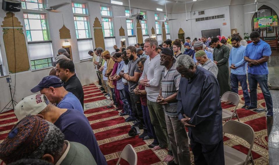 Men pray during the Jumu’ah prayer service lead by Imam Nasir Ahmed ahead of the start of Ramadan at Masjid Al-Ansar in Liberty City.