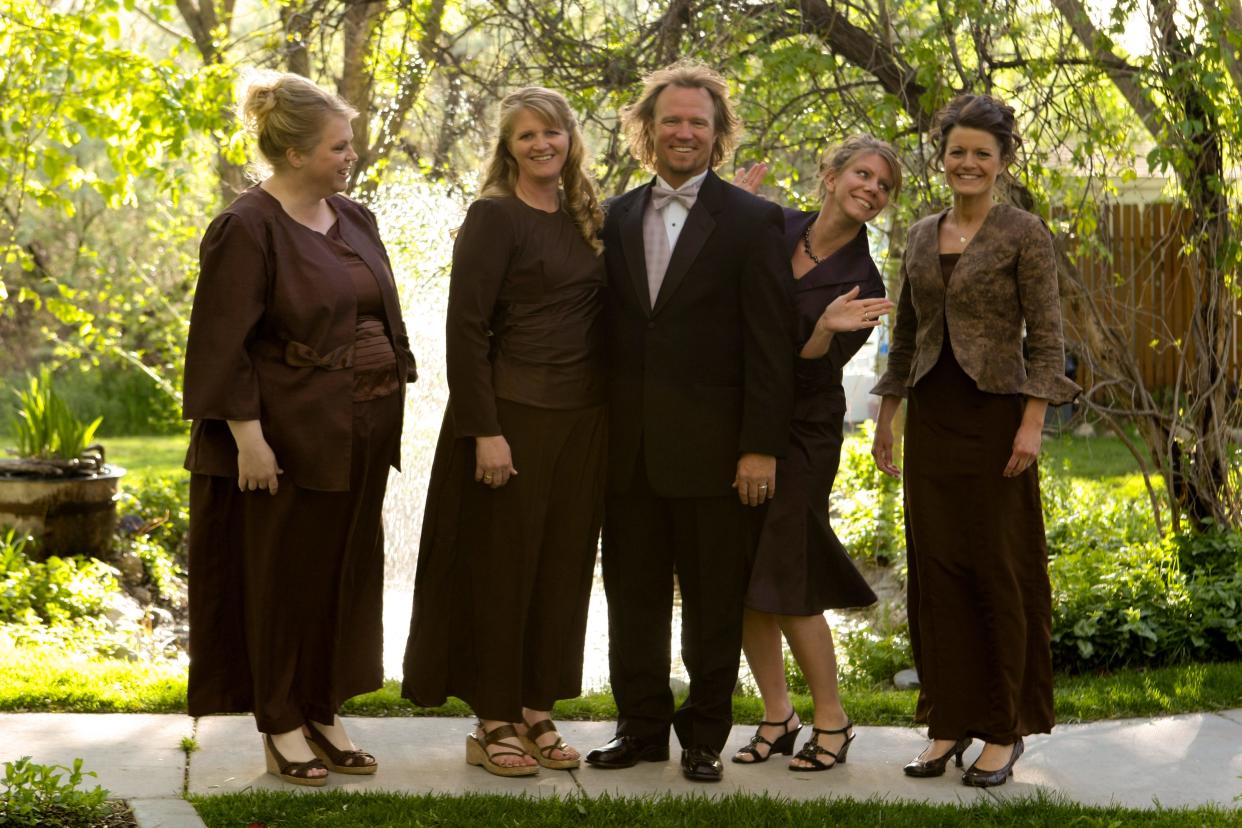 Kody, center, and left to right: Janelle, Christine, Kody, Meri and Robyn from the television program "Sister Wives."