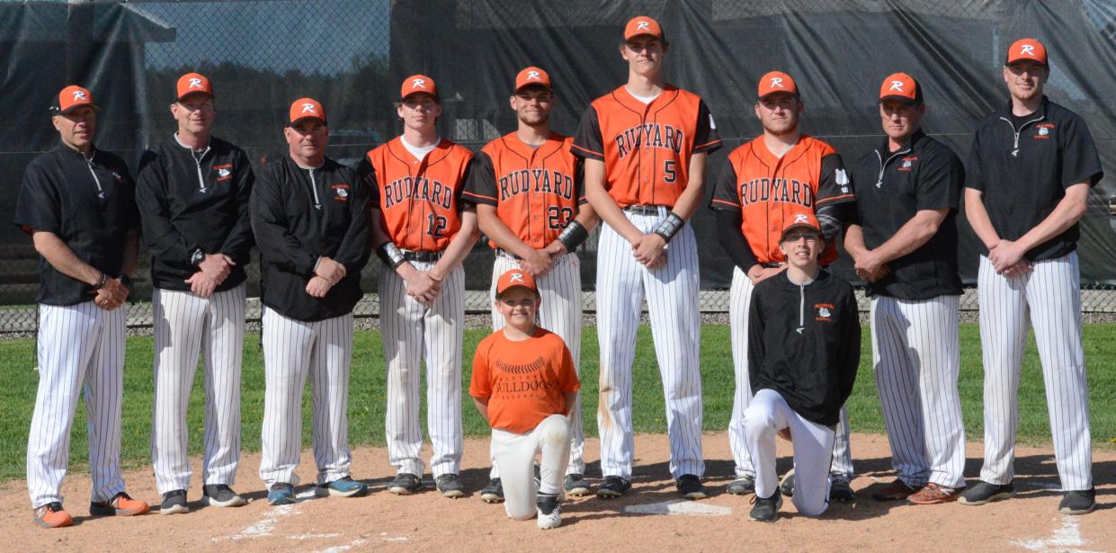 The Rudyard Bulldogs celebrated Senior Night Monday. Kneeling, front row from left to right are Marshall Dankert (Manager) Bryce Mitchell (Manager) ; back row, standing, from left to right: head coach Billy Mitchell, assistant coach Mark Sprague, assistant coach Brad Hall, Brett Mayer, Austin Warner, Tate Besteman, EJ Suggitt, assistant coach Jim Suggitt and assistant coach Jonah Sprague.