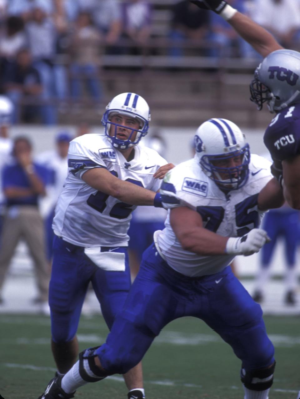 BYU quarterback Steve Sarkisian throws a pass during the Cougars' 45-21 win at TCU in 1996. The Cougars went 14-1 that year, becoming the first school in NCAA history to win 14 games in a season.