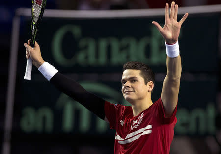 Canada's Milos Raonic reacts after beating Japan's Tatsuma Ito during their Davis Cup tennis match at the Doug Mitchell Thunderbird Sports Centre in Vancouver, British Columbia, March 6, 2015. REUTERS/Kevin Light