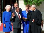 FILE - In this Oct. 18, 1991, file photo, Clarence Thomas is sworn in to the Supreme Court in Washington, by Justice Byron White. Watch from left are first lady Barbara Bush, President George H.W. Bush, behind Thomas, and Thomas' wife, Virginia Lamp Thomas. (AP Photo)