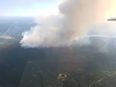 British Columbia wildfires seen near 100 Mile House in British Columbia, Canada in this handout photo obtained by Reuters July 7, 2017. BC Wildfire Service/Handout via REUTERS