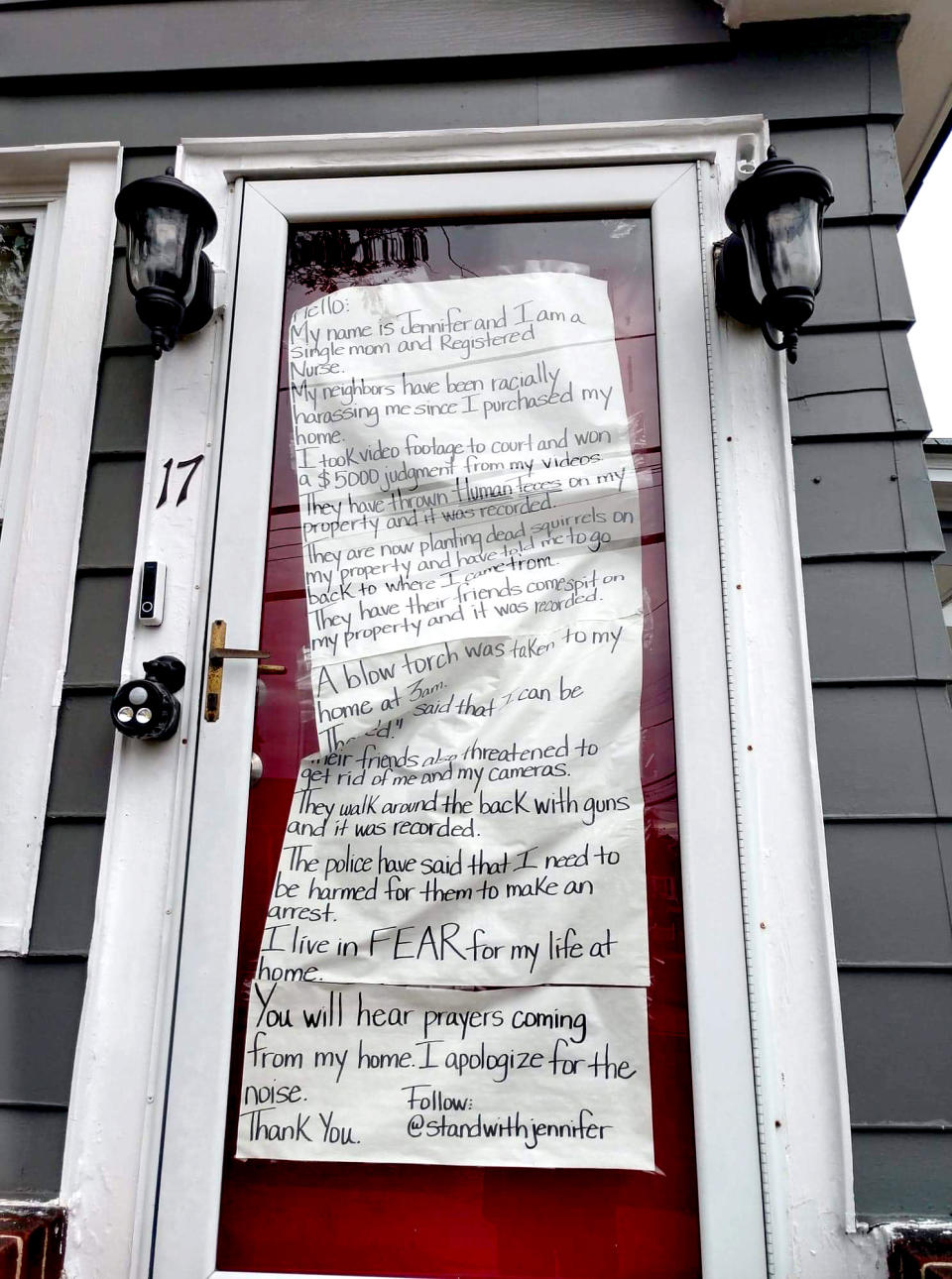 IMAGE: Sign on Jennifer McLeggan's door (Janelle Griffith / NBC News)