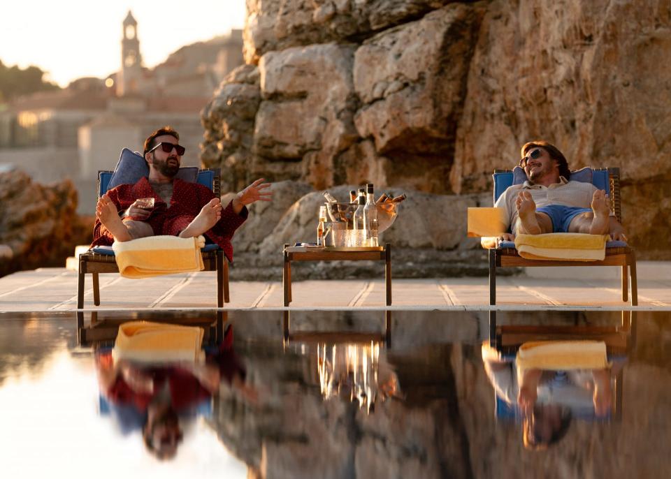 The Unbearable Weight Of Massive Talent, Nic Cage and Pedro Pascal by the pool