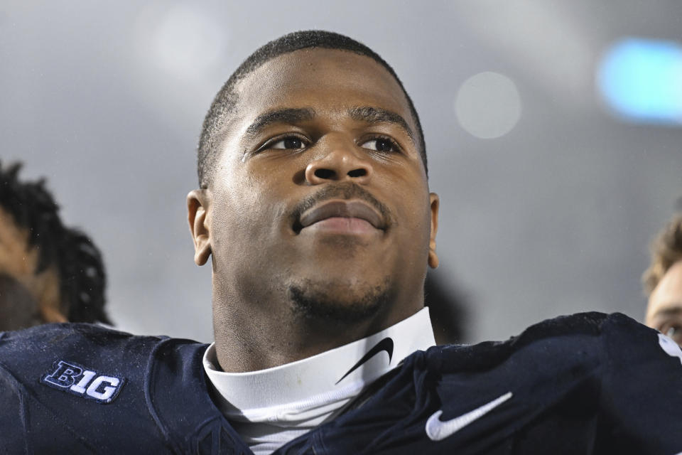 FILE - Penn State linebacker Abdul Carter (11) celebrates a 31-0 win over Iowa during an NCAA college football game, Saturday, Sept. 23, 2023, in State College, Pa. The much-anticipated matchup in Saturday’s Peach Bowl is No. 10 Penn State’s top-ranked defense against No. 11 Mississippi’s up-tempo offense. (AP Photo/Barry Reeger, File)