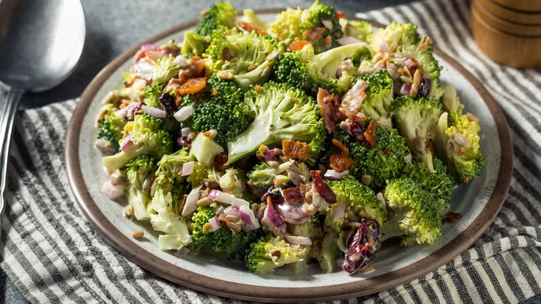 plate of broccoli salad with bacon and onions