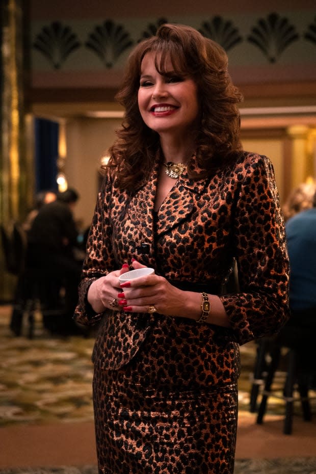Sandy (Geena Davis) who's manicure and ring are obscuring her fabulous belt. Photo: Ali Goldstein/Courtesy of Netflix