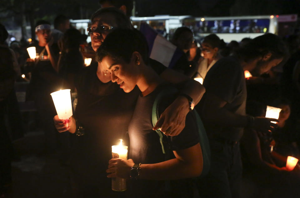 FILE - In this April 26, 2018 file photo, the journalism community holds a candlelight vigil in honor of slain journalist Angel Gahona who died on April 21 in the city of Bluefields while covering anti-government protests, in Managua, Nicaragua. The 2019 World Press Freedom Index compiled by Reporters Without Borders shows that Nicaragua fell 24 places from the previous year’s list due to attacks on journalists covering protests against President Daniel Ortega. (AP Photo/Alfredo Zuniga, File)