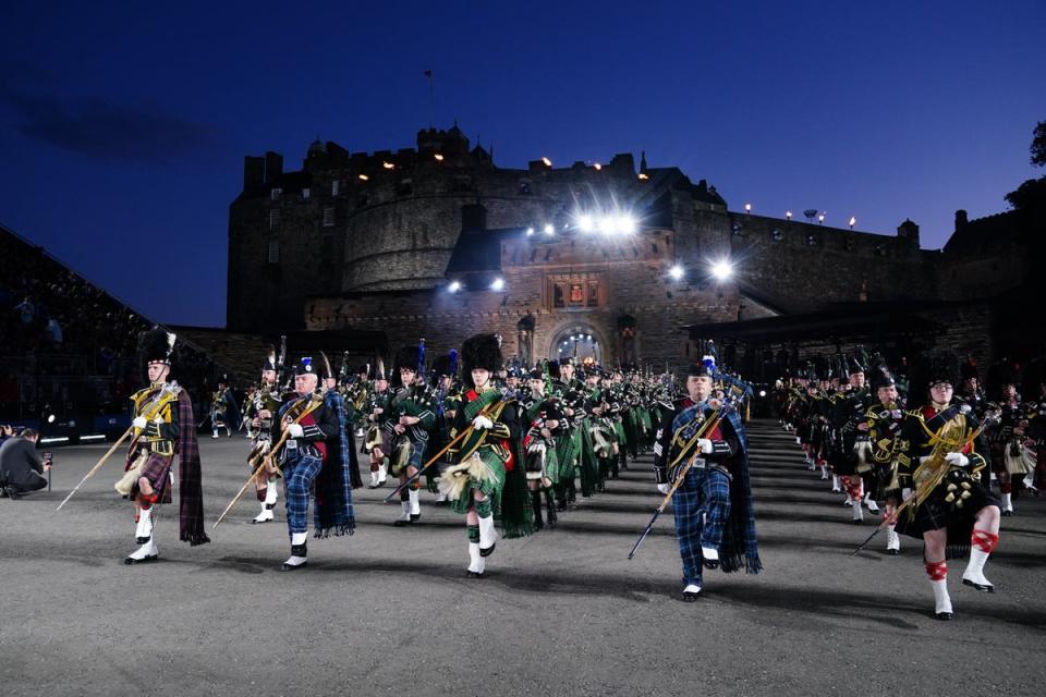 Members of the Massed Pipes and Drums taking part in the Royal Edinburgh Military Tattoo at Edinburgh Castle (Jane Barlow/PA) (PA Wire)
