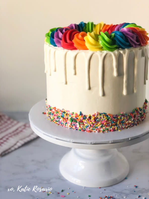 <p>This rainbow drip cake is made with soft layers of funfetti cake, vanilla rainbow buttercream and white chocolate dripping down the sides.</p><p><strong>Get the recipe: <a href="https://xokatierosario.com/rainbow-drip-cake/" rel="nofollow noopener" target="_blank" data-ylk="slk:Rainbow Drip Cake;elm:context_link;itc:0;sec:content-canvas" class="link rapid-noclick-resp"><em>Rainbow Drip Cake</em></a></strong></p>