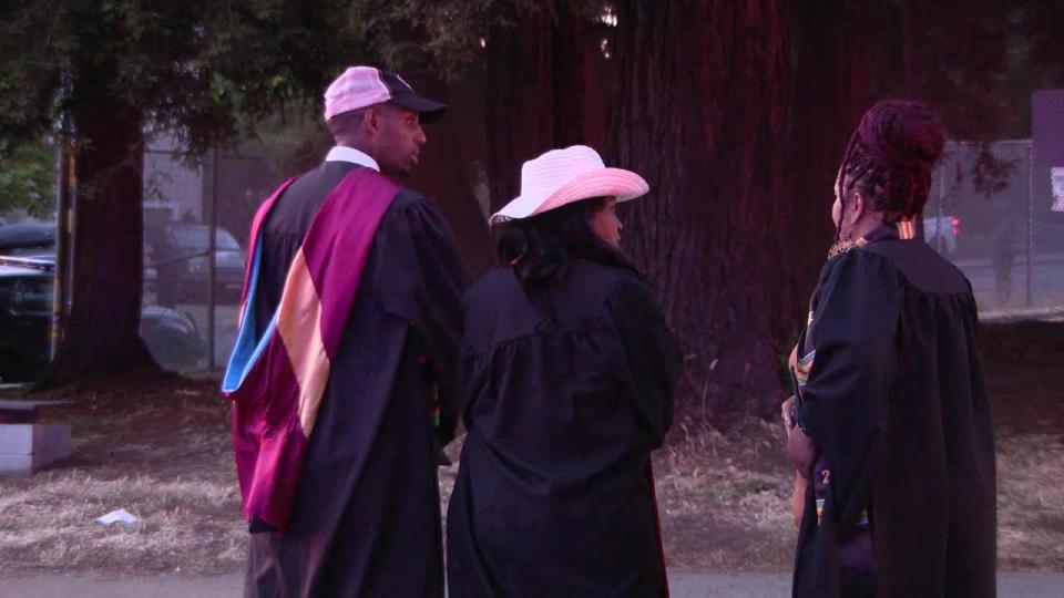 <div>Administrators huddle after a shooting at Skyline High School during graduation. May 23, 2024</div>