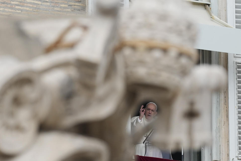 Pope Francis delivers his blessing during the Angelus noon prayer from the window of his studio overlooking St.Peter's Square, at the Vatican, Sunday, Oct. 3, 2021. (AP Photo/Alessandra Tarantino)