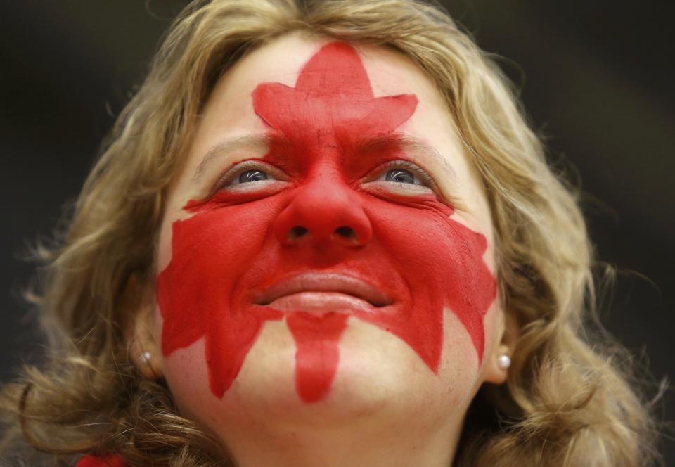 A Canadian supporter cheers before Canada plays United States in their IIHF World Junior Championship ice hockey game in Malmo
