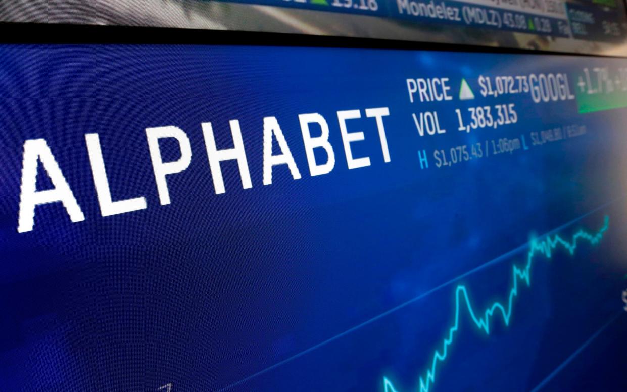 Alphabet logo appears on a screen at the Nasdaq MarketSite in New York