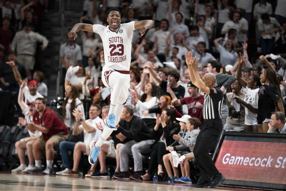 South Carolina forward Gregory Jackson II celebrates a teammate's three-pointer during the first half of an NCAA college basketball game Wednesday, Feb. 22, 2022, in Columbia, S.C. (AP Photo/Sean Rayford)