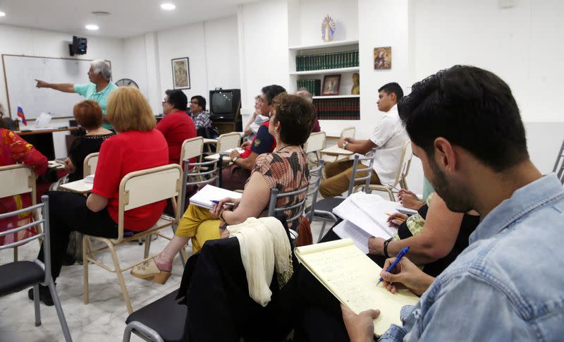 FILE PHOTO: Student takes notes during a Russian language class in Buenos Aires