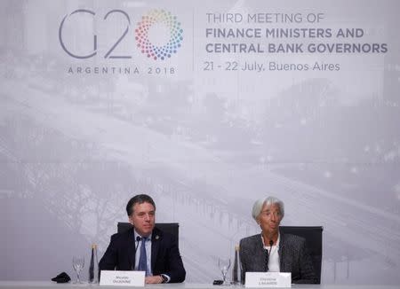 International Monetary Fund (IMF) Managing Director Christine Lagarde and Argentina's Treasury Minister Nicolas Dujovne attend a news conference in Buenos Aires, Argentina, July 21, 2018. REUTERS/Martin Acosta