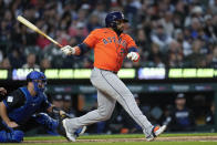 Houston Astros' Yainer Diaz hits a sacrifice fly against the Detroit Tigers in the eighth inning of a baseball game, Friday, May 10, 2024, in Detroit. (AP Photo/Paul Sancya)