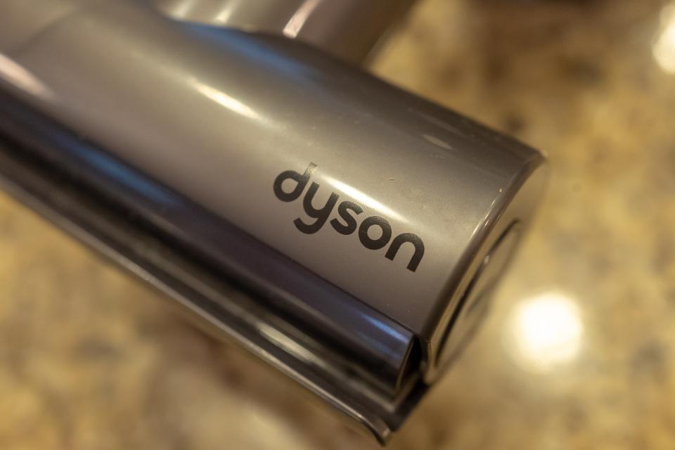 Close-up of logo for luxury vacuum cleaner company Dyson on end piece of vacuum cleaner, September 20, 2019. (Photo by Smith Collection/Gado/Getty Images)