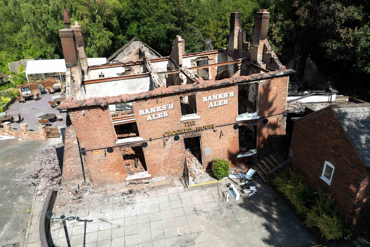 The Crooked House pub was destroyed in a fire on 5 August (PA Wire)
