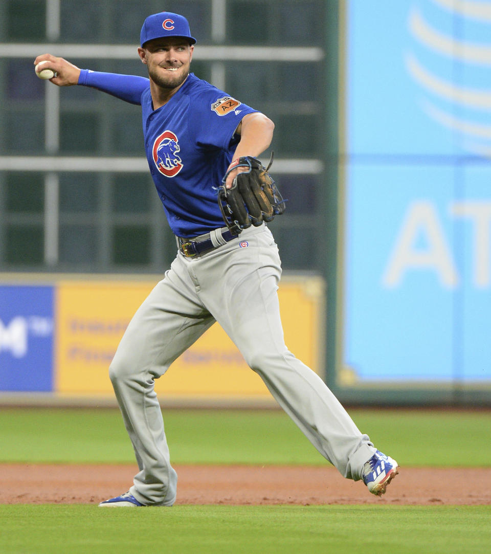 Chicago Cubs third baseman Kris Bryant throws out Houston Astros' George Springer during the first inning of an exhibition baseball game Friday, March 31, 2017, in Houston. (AP Photo/George Bridges)